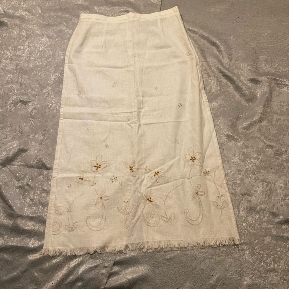 Requirement petite white skirt with wooden embellishments